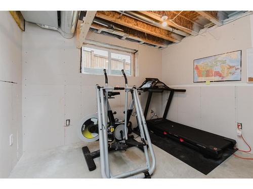 137 Hampton Crescent, Sylvan Lake, AB - Indoor Photo Showing Gym Room