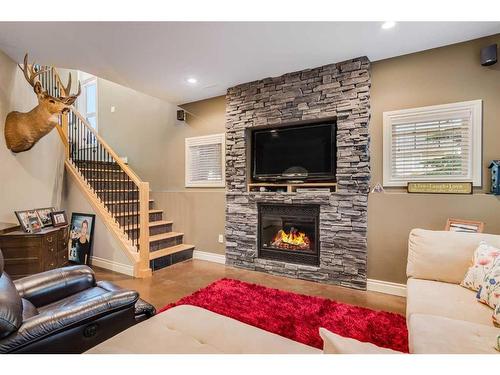 6 Ivany Close, Red Deer, AB - Indoor Photo Showing Living Room With Fireplace