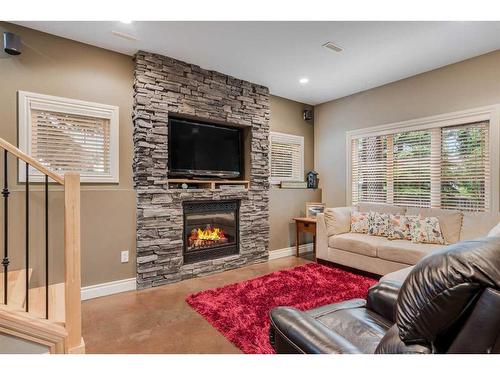 6 Ivany Close, Red Deer, AB - Indoor Photo Showing Living Room With Fireplace