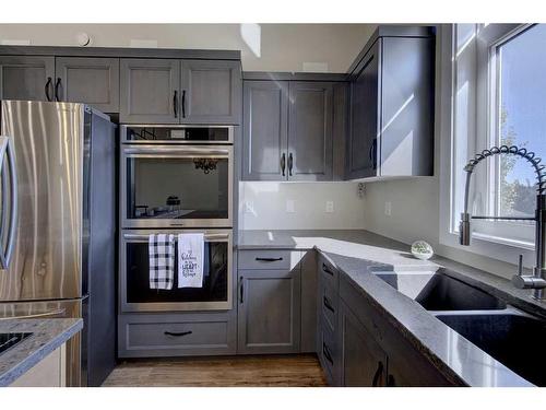 A/B-5333 76 Street, Red Deer, AB - Indoor Photo Showing Kitchen With Stainless Steel Kitchen With Double Sink