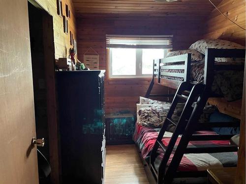 1303 Baptiste Drive, West Baptiste, AB - Indoor Photo Showing Bedroom