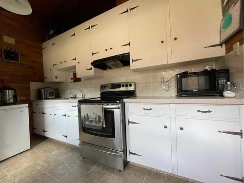 1303 Baptiste Drive, West Baptiste, AB - Indoor Photo Showing Kitchen