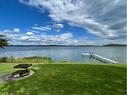 1303 Baptiste Drive, West Baptiste, AB  - Outdoor With Body Of Water With View 