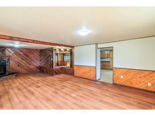 6743 59 Avenue, Red Deer, AB - Indoor Photo Showing Other Room With Fireplace