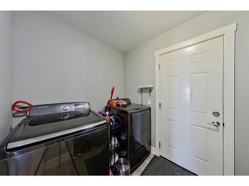 13 Valarosa Cove, Didsbury, AB - Indoor Photo Showing Laundry Room