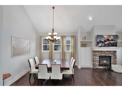 444 Summer Crescent, Rural Ponoka County, AB - Indoor Photo Showing Dining Room With Fireplace