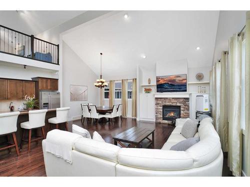 444 Summer Crescent, Rural Ponoka County, AB - Indoor Photo Showing Living Room With Fireplace