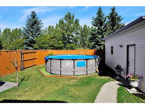 33 Duval Crescent, Red Deer, AB - Outdoor With Above Ground Pool