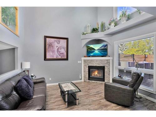 33 Duval Crescent, Red Deer, AB - Indoor Photo Showing Living Room With Fireplace