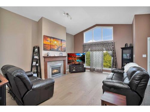 12-Range Road 22 51505, Rural Parkland County, AB - Indoor Photo Showing Living Room With Fireplace