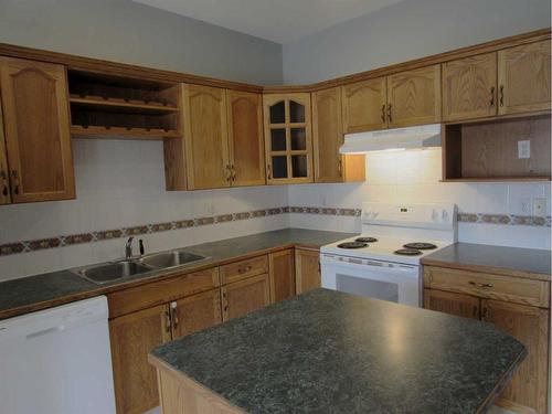 7 Adams Close, Red Deer, AB - Indoor Photo Showing Kitchen With Double Sink