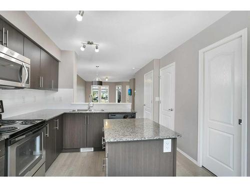 102-30 Carleton Avenue, Red Deer, AB - Indoor Photo Showing Kitchen With Double Sink With Upgraded Kitchen