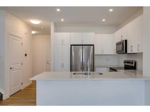 2095 Fowler Road Sw, Airdrie, AB - Indoor Photo Showing Kitchen