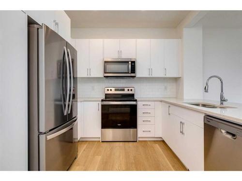 2095 Fowler Road Sw, Airdrie, AB - Indoor Photo Showing Kitchen