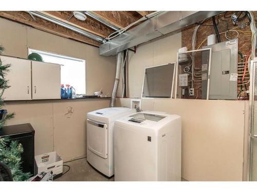 67 Long Close, Red Deer, AB - Indoor Photo Showing Laundry Room