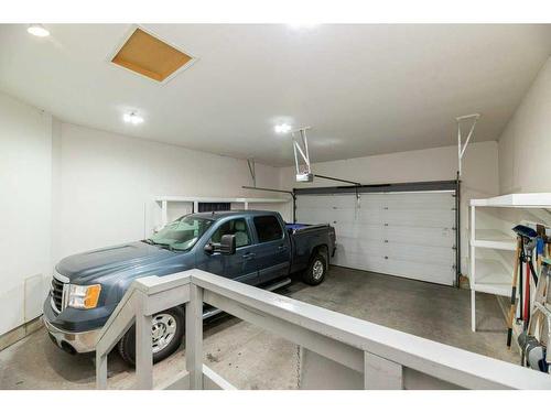 8-5202 Farrell Avenue, Red Deer, AB - Indoor Photo Showing Garage