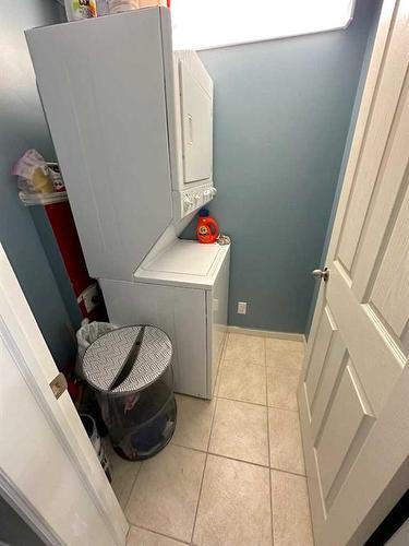 #116-5040 53 Street, Sylvan Lake, AB - Indoor Photo Showing Laundry Room