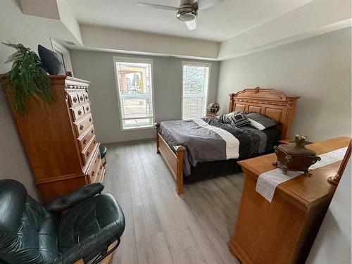 #116-5040 53 Street, Sylvan Lake, AB - Indoor Photo Showing Bedroom