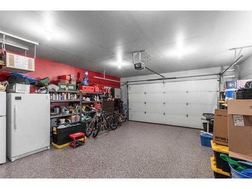 28 Van Dorp Street, Red Deer, AB - Indoor Photo Showing Garage