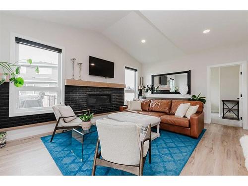 240 Ellington Crescent, Red Deer, AB - Indoor Photo Showing Living Room With Fireplace