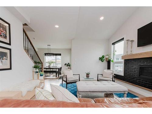 240 Ellington Crescent, Red Deer, AB - Indoor Photo Showing Living Room With Fireplace