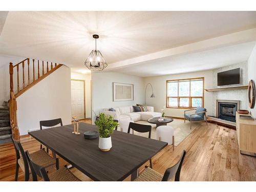 27 Jarvis Bay Drive, Jarvis Bay, AB - Indoor Photo Showing Dining Room With Fireplace