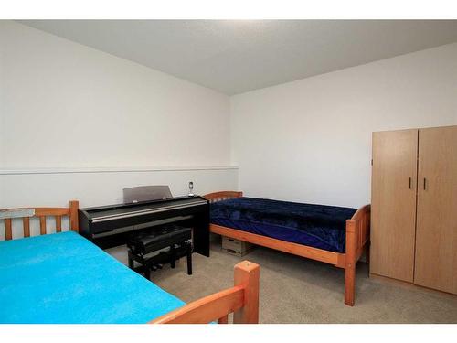 106 Lord Close, Red Deer, AB - Indoor Photo Showing Bedroom