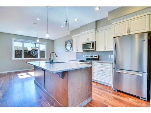 1073 New Brighton Grove Se, Calgary, AB - Indoor Photo Showing Kitchen With Upgraded Kitchen