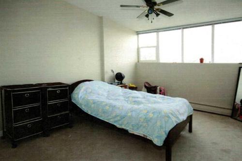 302-4820 47 Avenue, Red Deer, AB - Indoor Photo Showing Bedroom