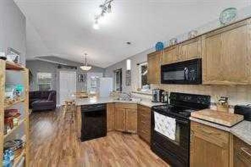 5800 56 Avenue, Red Deer, AB - Indoor Photo Showing Kitchen With Double Sink