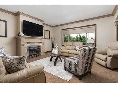 5507 28 Avenue, Camrose, AB - Indoor Photo Showing Living Room With Fireplace