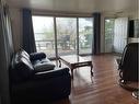 1301 Baptiste Drive, West Baptiste, AB  - Indoor Photo Showing Living Room 