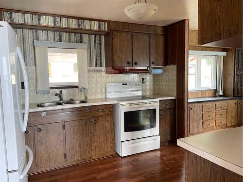 1301 Baptiste Drive, West Baptiste, AB - Indoor Photo Showing Kitchen With Double Sink