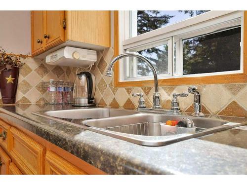 32570 Range Road 51, Rural Mountain View County, AB - Indoor Photo Showing Kitchen With Double Sink