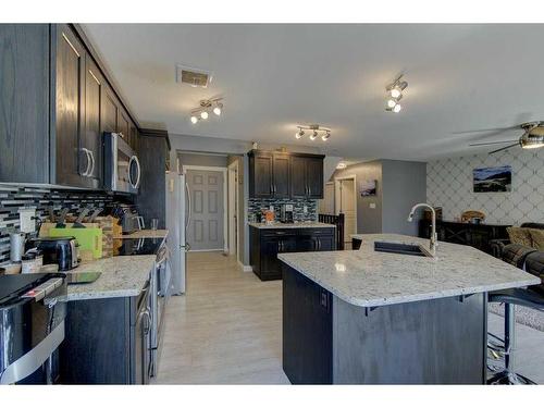 4825 Aspen Lakes Boulevard, Blackfalds, AB - Indoor Photo Showing Kitchen With Upgraded Kitchen