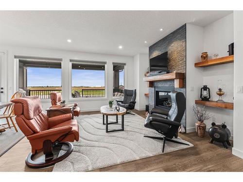 16 Vireo Avenue, Olds, AB - Indoor Photo Showing Living Room With Fireplace