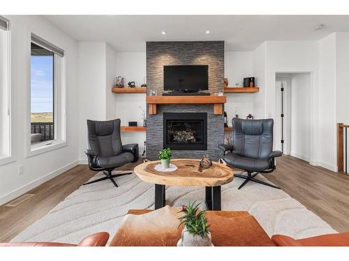 16 Vireo Avenue, Olds, AB - Indoor Photo Showing Living Room With Fireplace