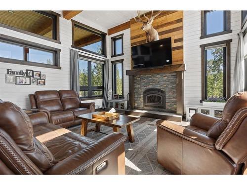 104-20419 Twp 412, Rural Camrose County, AB - Indoor Photo Showing Living Room With Fireplace