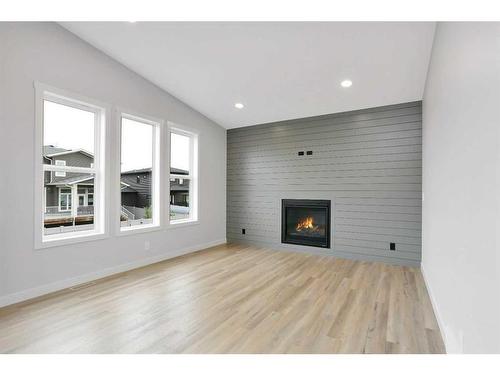 50 Larose Crescent, Red Deer, AB - Indoor Photo Showing Living Room With Fireplace