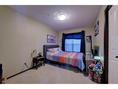 101-3505 51 Avenue, Red Deer, AB - Indoor Photo Showing Bedroom