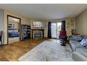 101-3505 51 Avenue, Red Deer, AB  - Indoor Photo Showing Living Room With Fireplace 