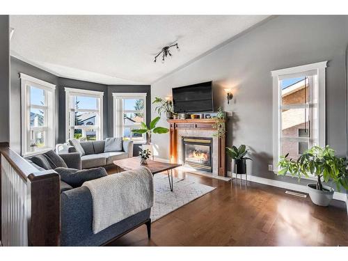 25 Regent Close, Lacombe, AB - Indoor Photo Showing Living Room With Fireplace