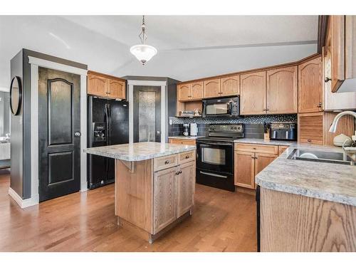 25 Regent Close, Lacombe, AB - Indoor Photo Showing Kitchen With Double Sink