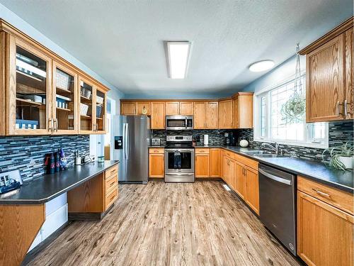 5916 42 Avenue, Stettler, AB - Indoor Photo Showing Kitchen With Double Sink