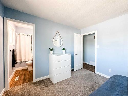 5916 42 Avenue, Stettler, AB - Indoor Photo Showing Bedroom