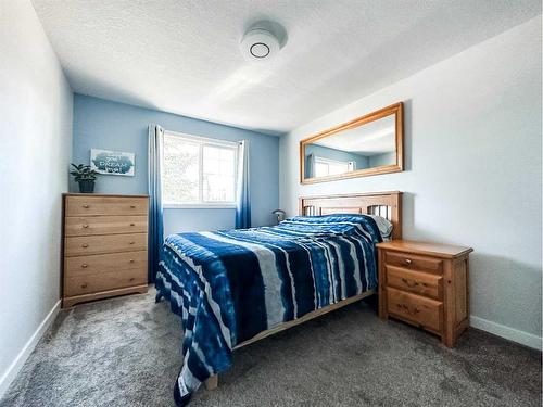 5916 42 Avenue, Stettler, AB - Indoor Photo Showing Bedroom