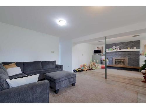 29 Grand Park Crescent, Camrose, AB - Indoor Photo Showing Living Room With Fireplace