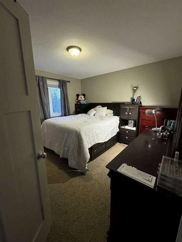 413 10B Street, Nobleford, AB - Indoor Photo Showing Bedroom