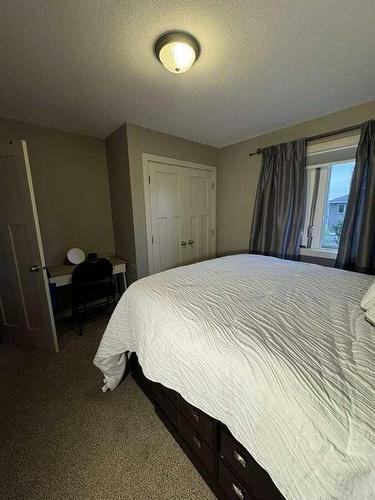 413 10B Street, Nobleford, AB - Indoor Photo Showing Bedroom