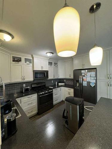 413 10B Street, Nobleford, AB - Indoor Photo Showing Kitchen